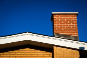 Gable of Brick House With Chimney